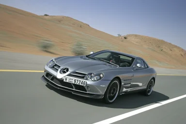 Mercedes-Benz SL 65 AMG in dynamischer Car-to-Car-Aufnahme auf einer Rennstrecke – Automobilfotografie von Dieter Rebmann.