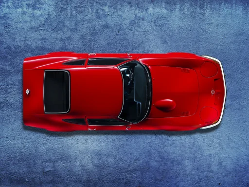 Roter Opel GT in Draufsicht auf blauem Hintergrund 
